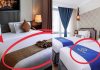 Čemu zapravo služi uska traka od tkanine preko hotelskog kreveta? Čemu zapravo služi uska traka od tkanine preko hotelskog kreveta? - featured image